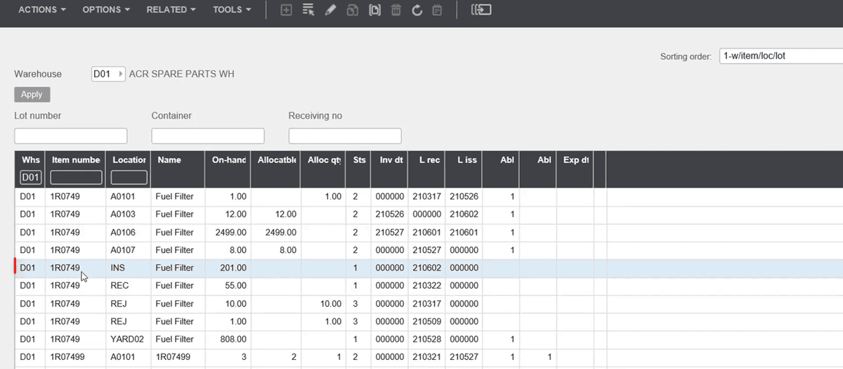 Infor M3 warehouse balance grid showing on-hand and allocated quantities by storage location