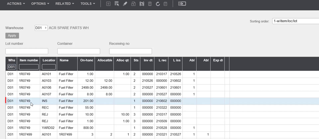 Infor M3 warehouse balance grid showing on-hand and allocated quantities by storage location
